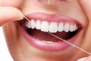Four simple steps to flossing. Two minutes a day for optimal oral health. Read on or call Houston family dentist Dr. Sanaz Khavari at 713-659-0841 to learn more
